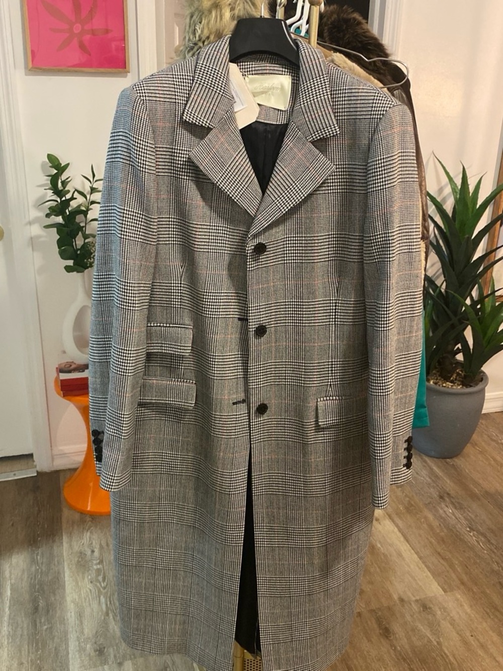 NWT DOEN COAT IN A SIZE LARGE.